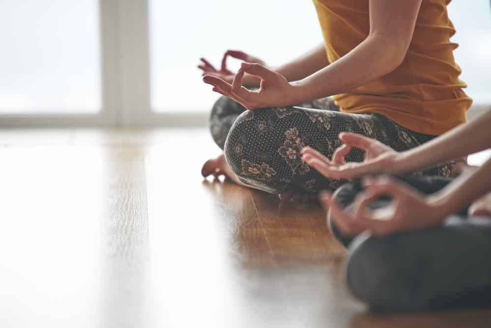 two women practicing self care 