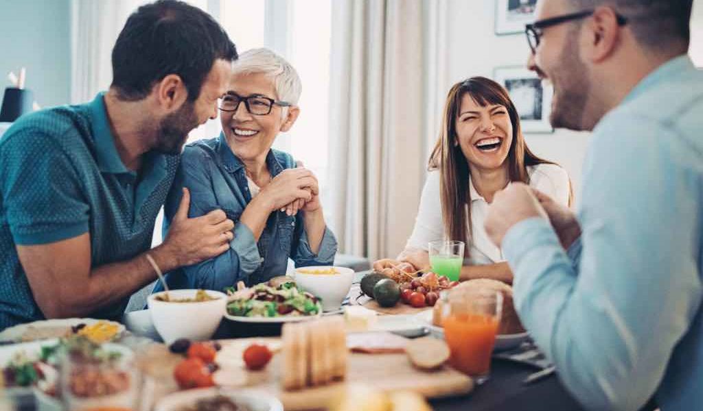 brother and sister setting healthy boundaries with parents at the dinner table