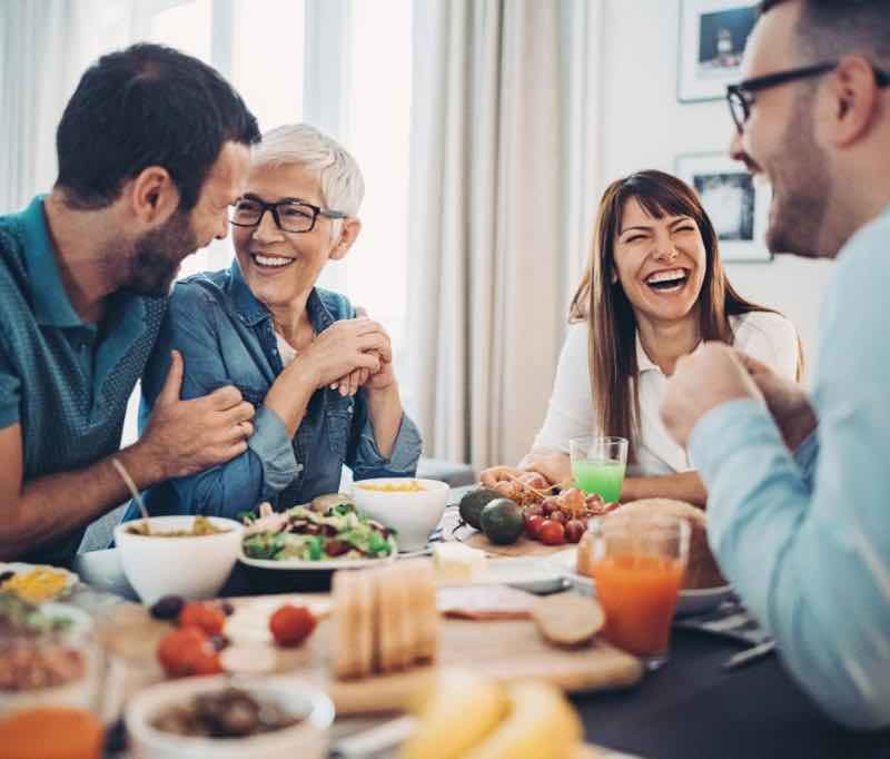 brother and sister setting healthy boundaries with parents at the dinner table