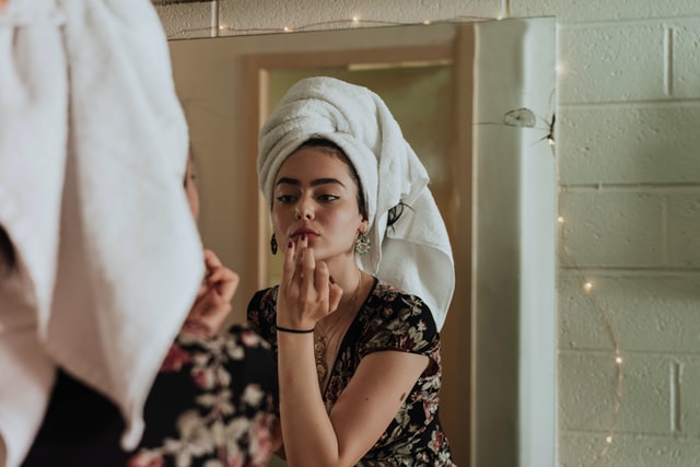 woman getting ready to surprise her boyfriend 