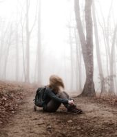 girl alone in a forest
