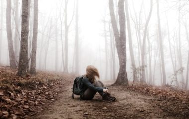 girl alone in a forest