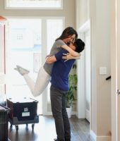 couple celebrating moving in together