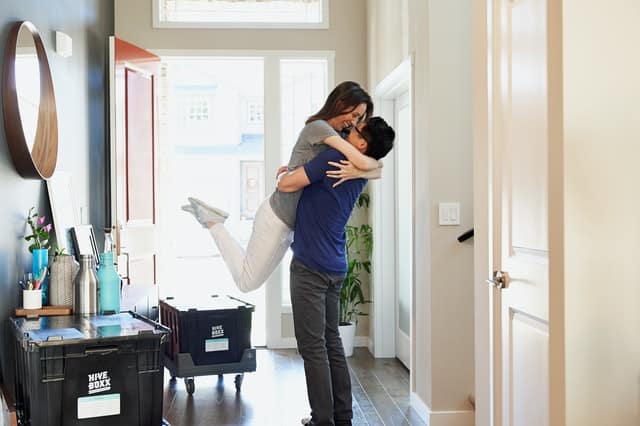 couple celebrating moving in together
