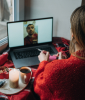 couple on the computer FaceTiming online dating