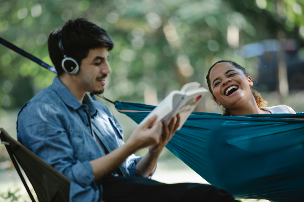 couple listening to music and laughing together