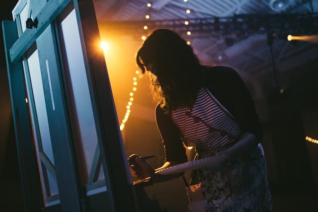 girl paiting at night
